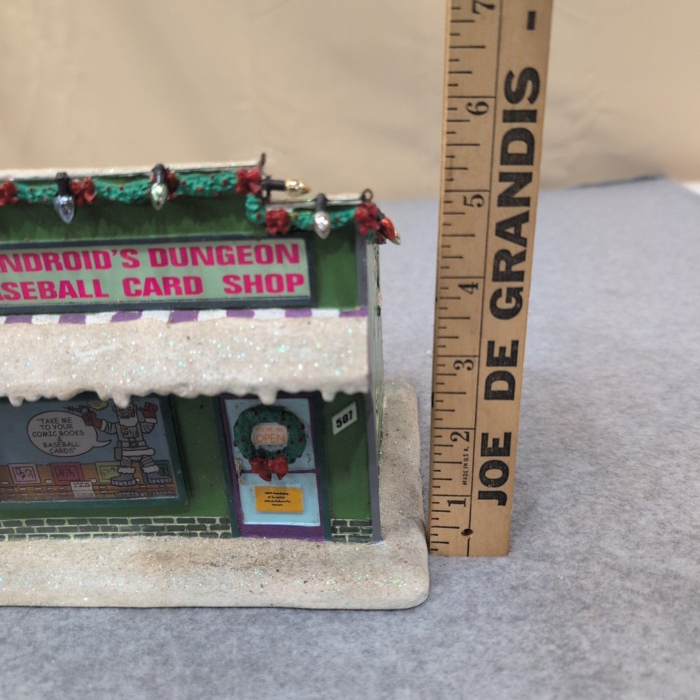 The Simpsons Android's Dungeon Baseball Card Shop Christmas Village Building - Picture 4 of 7